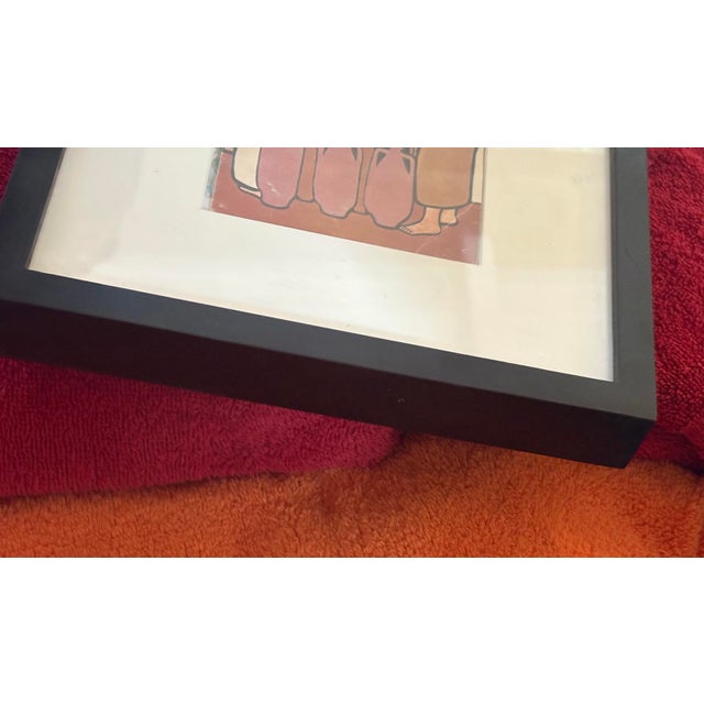 Vibrant framed art print featuring a colorful scene. Perfect for adding a splash of color to any room. And some serious...