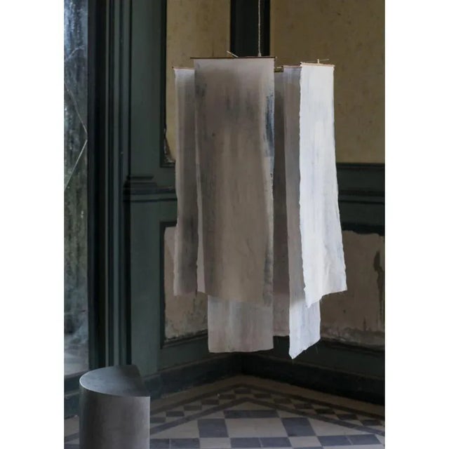 Saïto Pendant Lamp by Mylene Niedzialkowski Dimensions: Ø 45 x H 120 cm. Materials: Silk fabric, steel, wood and brass....