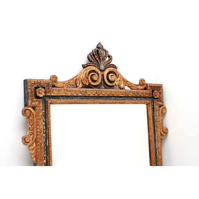 A stunning antique Italian gilt wood mirror, dating from around the 1900-1920 period. It is of very fine quality and is an...