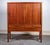 Elegant cabinet designed by Hans J. Wegner in the 1950s, crafted in mahogany. The piece features two sliding doors, pull-...