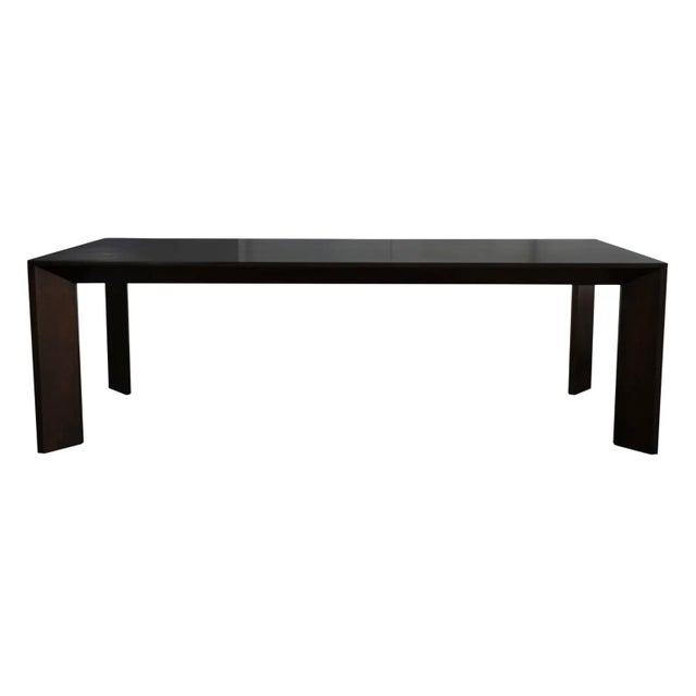 A Restoration Hardware Modern Arles Dining Table with Glass Cover Introduced in Paris in the 1930s, the Parsons table has...