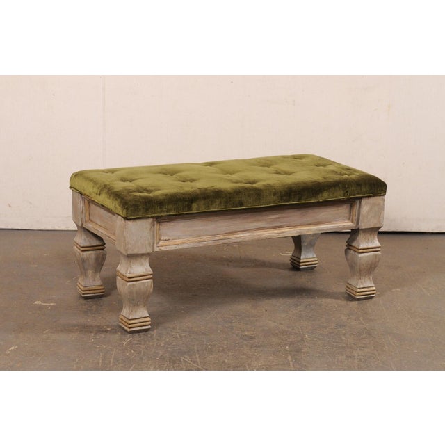 A vintage American carved-wood bench with upholstered seat. This bench, just over 3.5 feet in length, has an upholstered...
