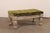A vintage American carved-wood bench with upholstered seat. This bench, just over 3.5 feet in length, has an upholstered...