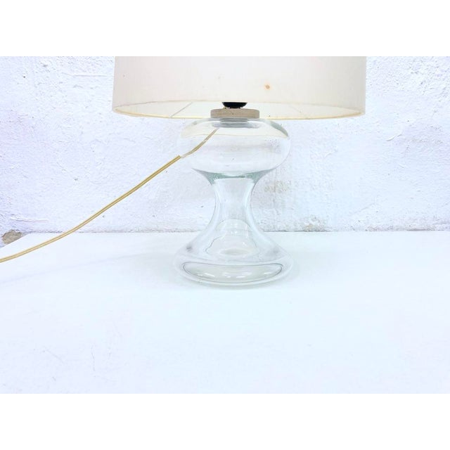 One 1970s table lamp, single-bulb, e27 socket. Designed by ingo maurer for design m, model ml1. glass, fabric-covered...