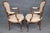 This attractive pair of French Louis XV-style armchairs, dating to approximately the 1940s, displays the graceful curves,...