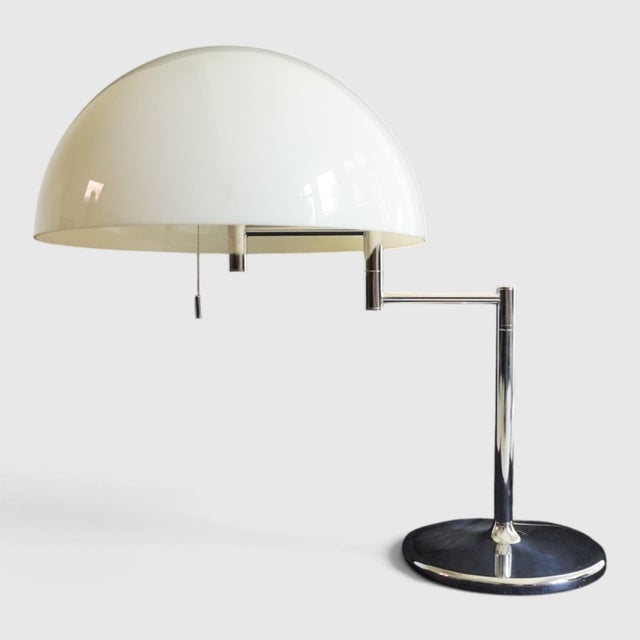 This table lamp comes from the long-established Swiss lighting manufacturer Swisslamps International (also known as Swiss...