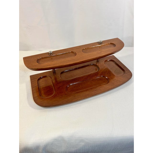 This Vintage Mid-Century London Leather dresser top valet tray organizer has six sections on wooden tiers. Stainless steel...
