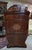 A spectacular "tulip" secretary desk with a richly inlaid drop-front, remarkable for both its proportions and the...