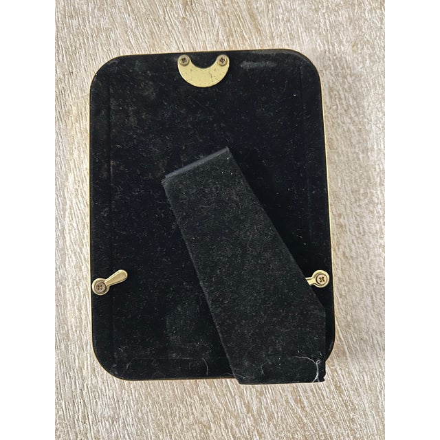 Elevate your favorite photograph or artwork with this stunning vintage polished brass picture frame. Featuring a classic...