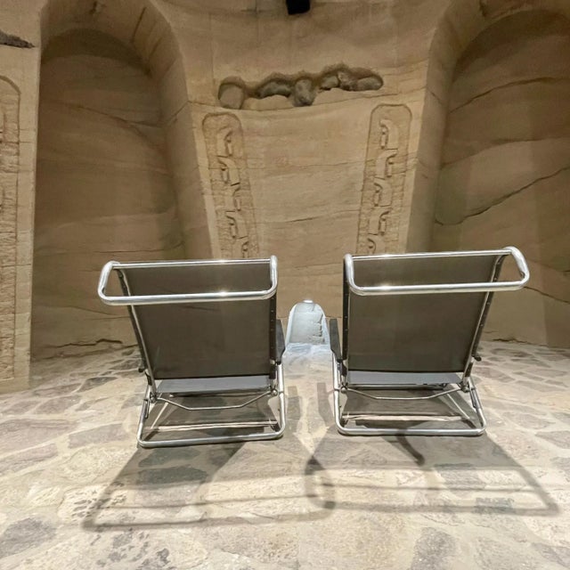 For your consideration, an eye catching modern by TELESCOPE of Granville New York, Pair of modern beach patio folding...