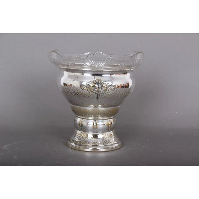 Flower bowl in hammered silver plating. TB / Thorvald Bindesbøll. Bowl in good condition but some wear to the silver...