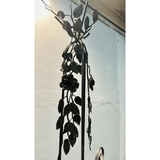 French art deco chandelier, wrought iron structure, central acetate and molated glass. Up to 250V (Europe/UK Standard).The...
