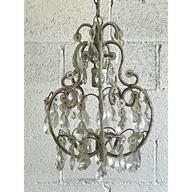 Adorn your space with the delicate sparkle of this enchanting vintage beaded crystal pendant. A beautiful example of...