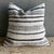 Creamy white hemp rug pillow with stripes. Soft hand, linen blend backing with zipper closure. Spot cleaning is...