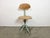 This industrial height adjustable, rotating chair was made in former Czechoslovakia during the 1950s.It features a green...