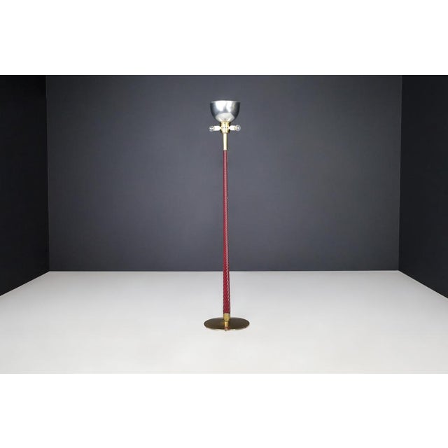 J.t. Kalmar floor lamp in brass and ruby glass rod, austria, 1960s a rare and elegant piece from the celebrated austrian...