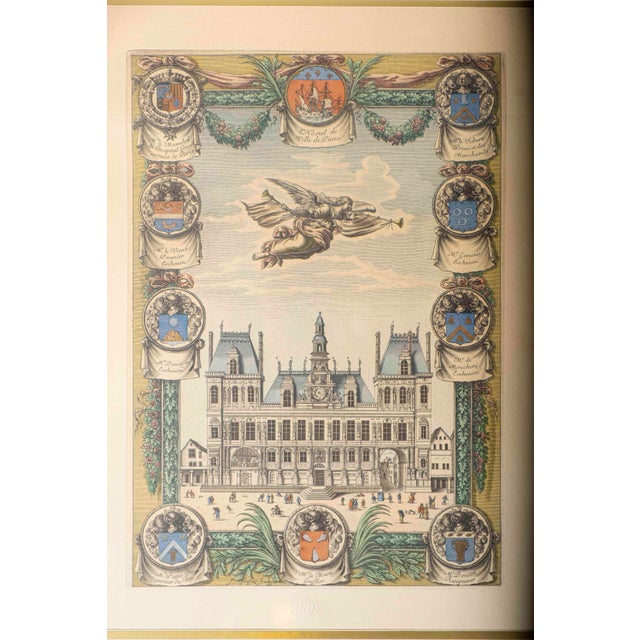 A colored Chalcographie du Louvre impression of Jean Frosne’s engraving L’Hostel de Ville de Paris, presented under glass...