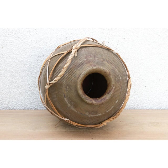 Brown Antique Asian Stoneware Pot With Rattan Harness For Sale - Image 8 of 10