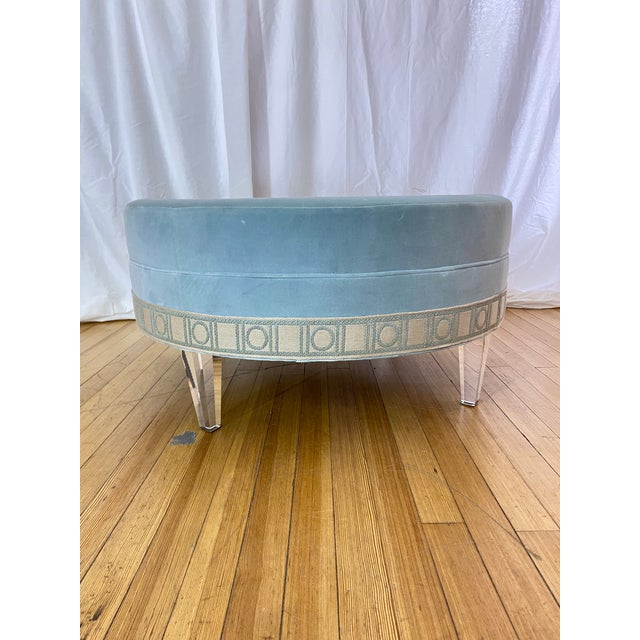 Kravet Hollywood Regency upholstered coffee table featuring pale blue velvet upholstery accented with pale blue and ivory...