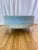 Kravet Hollywood Regency upholstered coffee table featuring pale blue velvet upholstery accented with pale blue and ivory...