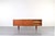 This teak sideboard was manufactured in Denmark in the 1960s. The piece has been professionally and carefully restored by...