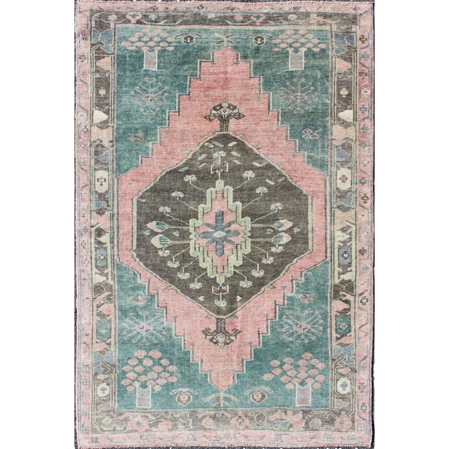 Teal, Brown & Salmon-Colored Vintage Turkish Oushak Rug With Geometric Medallion For Sale