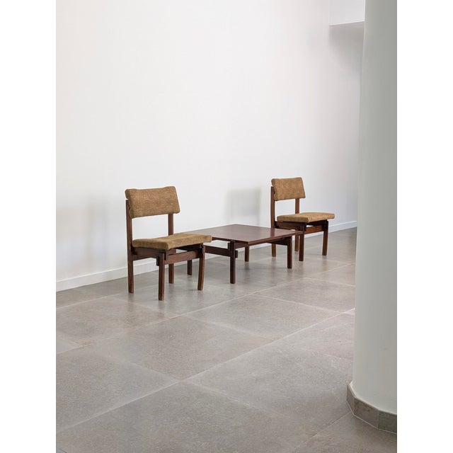 Pair of solid wood chairs from the 1950s, with a design clearly influenced by Gerrit Rietveld's structural and functional...