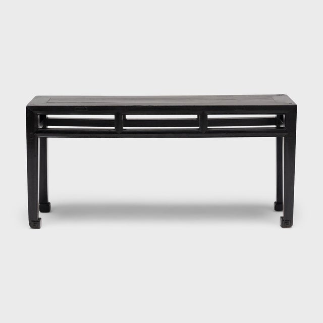 This antique Chinese bench was a versatile seat in the Qing-dynasty home, whether placed beside the table for meals or...