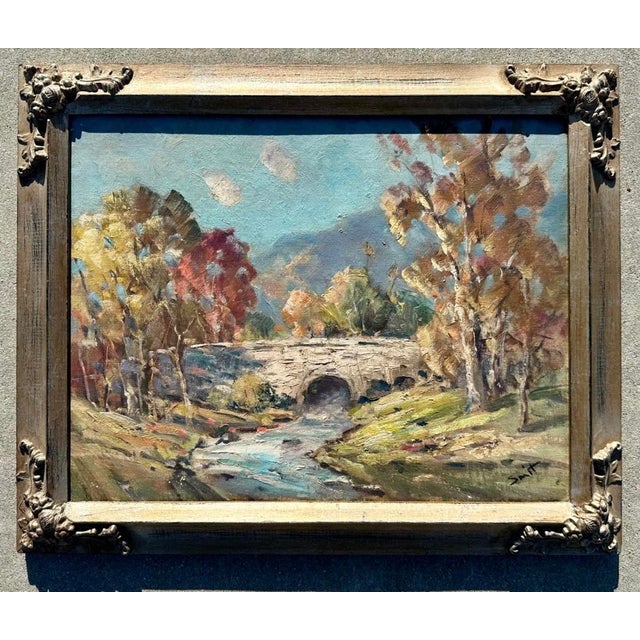 Derk Smit (1889–1985) – Original Oil Landscape Painting Bridge Over Stream with Autumn Foliage This captivating oil-on-...