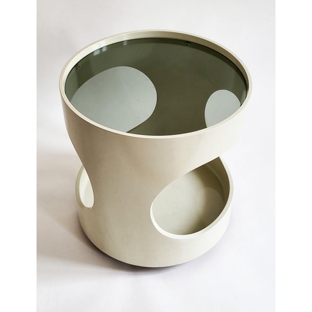 Sleek sixties side table, by opal chic 1960s space age side table on wheels, very good original condition, smooth surface,...