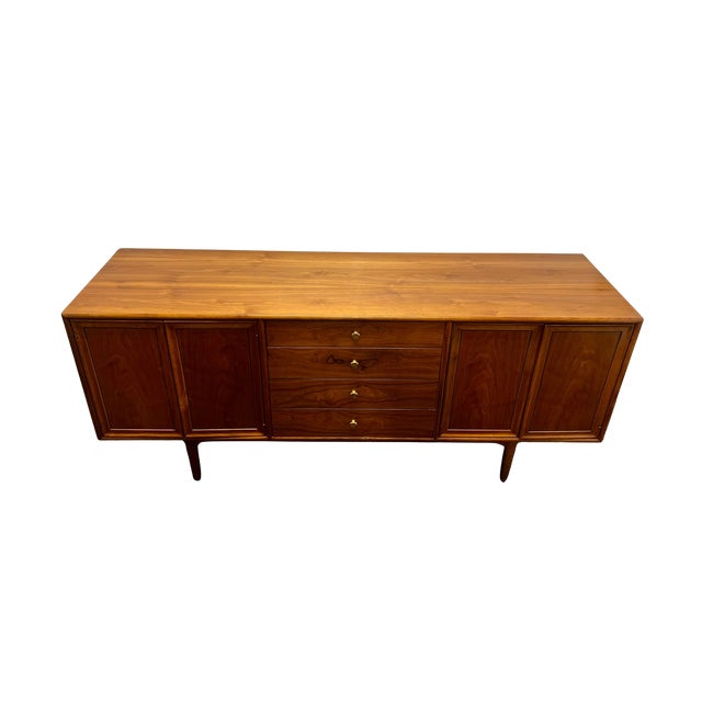 An iconic and highly sought-after piece of American Mid Century Modern design, this large credenza/buffet is part of the...