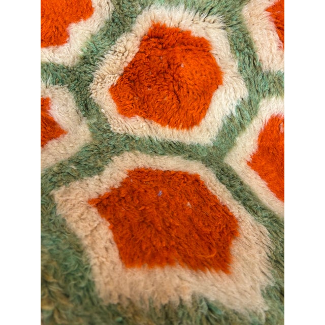 This exceptional Moroccan Mrirt rug is handwoven from premium natural wool by skilled Berber artisans. Featuring a...