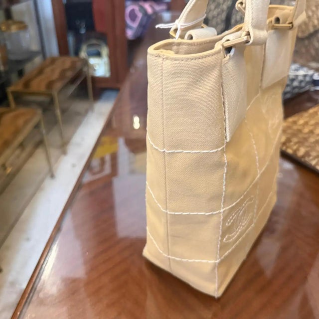 A Vintage 2000s Chanel Beige Canvas Tote Bag in Excellent Condition For Sale - Image 16 of 17