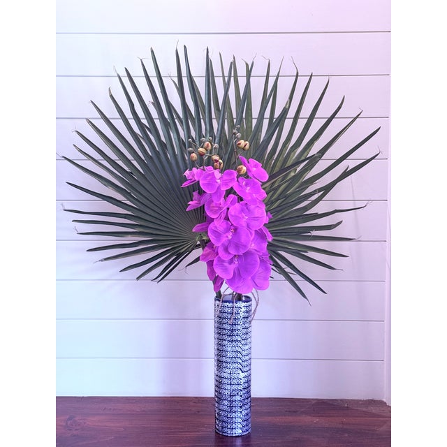 Bold, sculptural and unmistakably refined, Palm Royale Orchid is designed to make an entrance. Featuring a dramatic fan of...