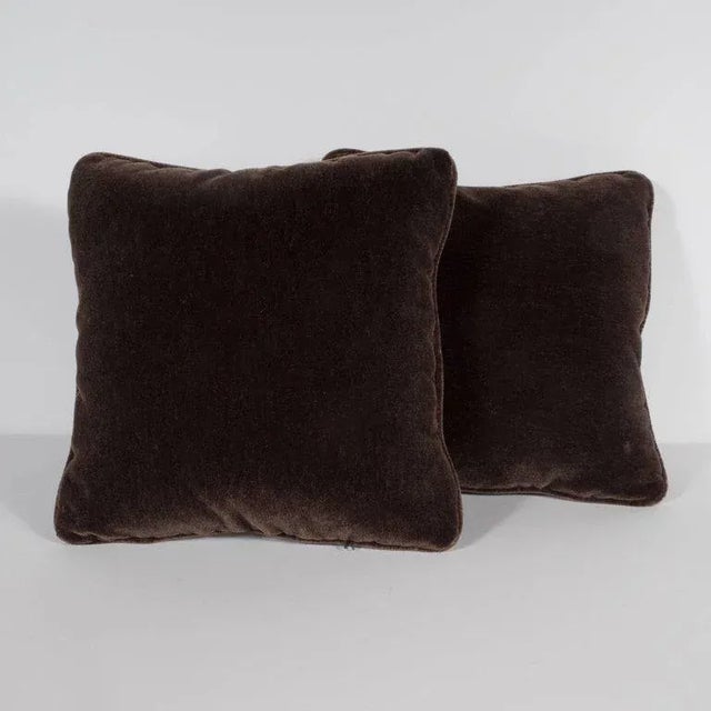 This stunning pair of square pillows have been upholstered in a luxe chestnut brown mohair. Their austere form and...