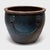 This grand terracotta fish pond is cloaked in a beautiful, blue glaze with tonal variation from dark cobalt to pale grey...