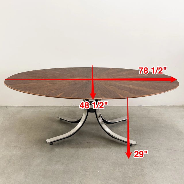 Often attributed to Osvaldo Borsani, this authentic 1970s Stow & Davis oval dining table has been confirmed as an original...