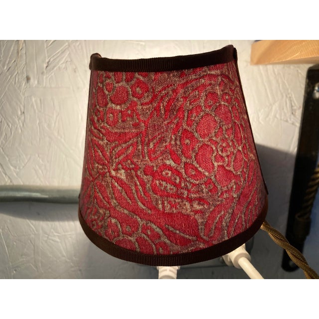 A plug in nightlight hand made from Fortuny’s iconic Fiori printed fabric
