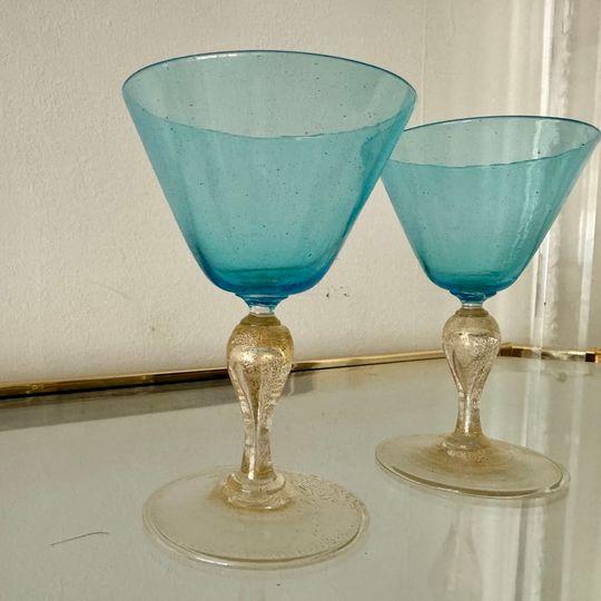 Blue with clear and metallic gold stems. No flaws.