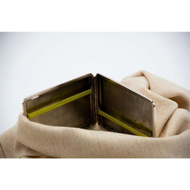 Plain Silver Cigarette Case with Raised Trim and Spring-Loaded Hinged Lid, in Good conditions.