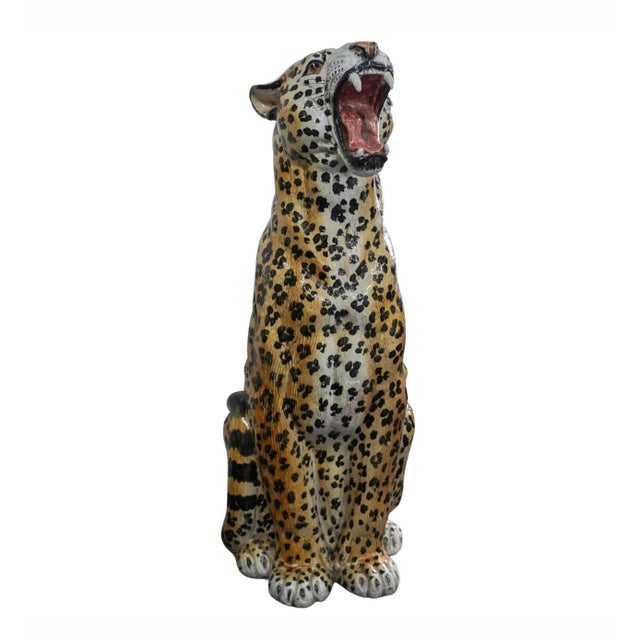 Life Size Italian Terracotta Painted Leopard 20th century, Italy A large terracotta leopard statue with hand-painted...