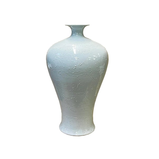 This is a handmade oriental off white color porcelain dots relief floral pattern pear shape vase. Dimensions: Dia 12" x...