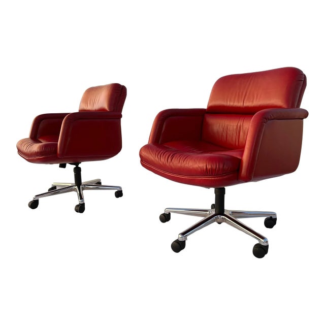 A seldom seen pair of oversized executive chairs in red leather after Otto Zapf having five prong polished chrome...