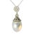Elegant Estate 18K White Gold Filigree Pendant featuring a 12x”11 mm cultured white pearl surrounded by 44 sparkling...