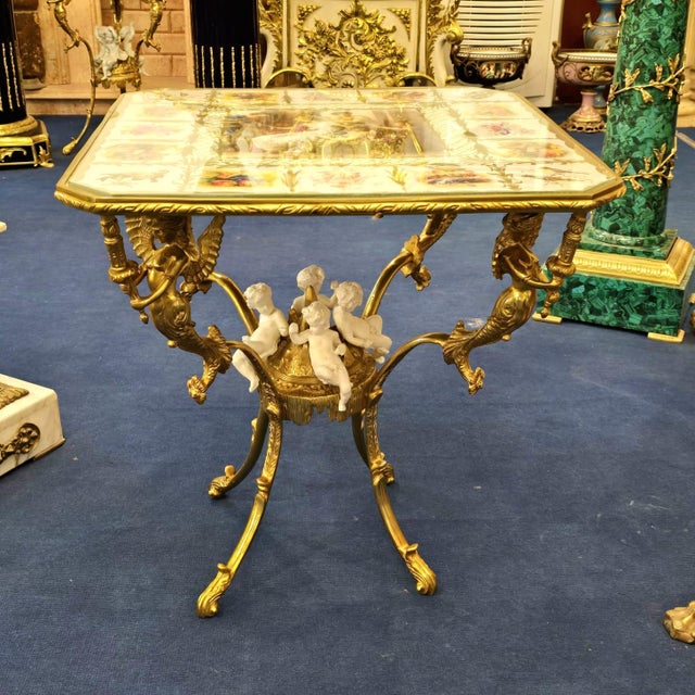 This exquisite French-style coffee table embodies feminine elegance and romantic European artistry. Featuring a delicate...