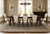 Elegant set of eight vintage Art Deco style dining chairs featuring ivory suede-like upholstery, dark mahogany-toned wood...