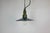 Industrial blue enamel pendant light made in Poland during the 1960s. White enamel inside the shade. Green cast aluminium...
