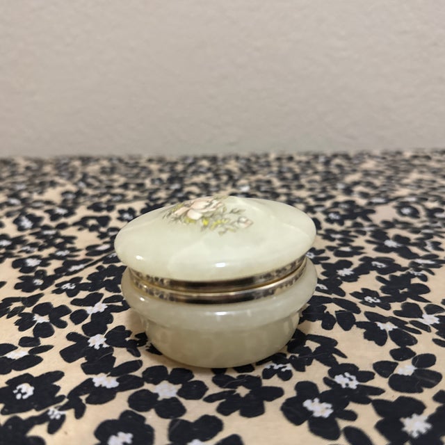 This elegant, hand-carved genuine alabaster trinket box is a classic mid-century find from Italy. It features a delicate...