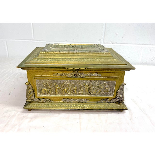 Up for sale is a large antique Spanish Baroque desk box made of a two toned heavy brass with ornate detailing. Originating...