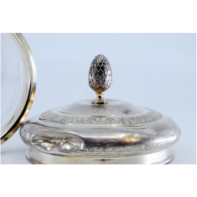 Glass Bottle with Embossed Silver Lid and Pine Cone-Shaped Handle, in Good conditions.